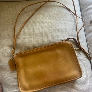 A coach 1970s purse with coach leatherware embossed. Light use. Camel colored.